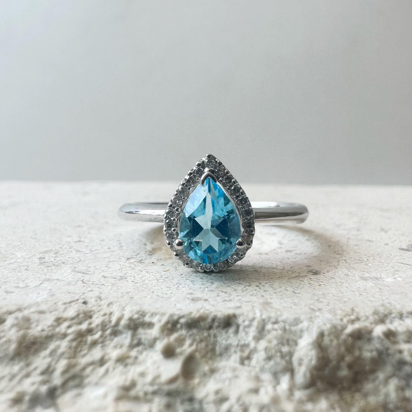 14K White Gold Blue Topaz Teardrop Ring with Diamond Halo
