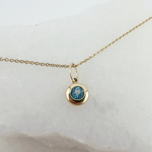 14K Solid Gold Genuine Bezel Blue Topaz Pendant