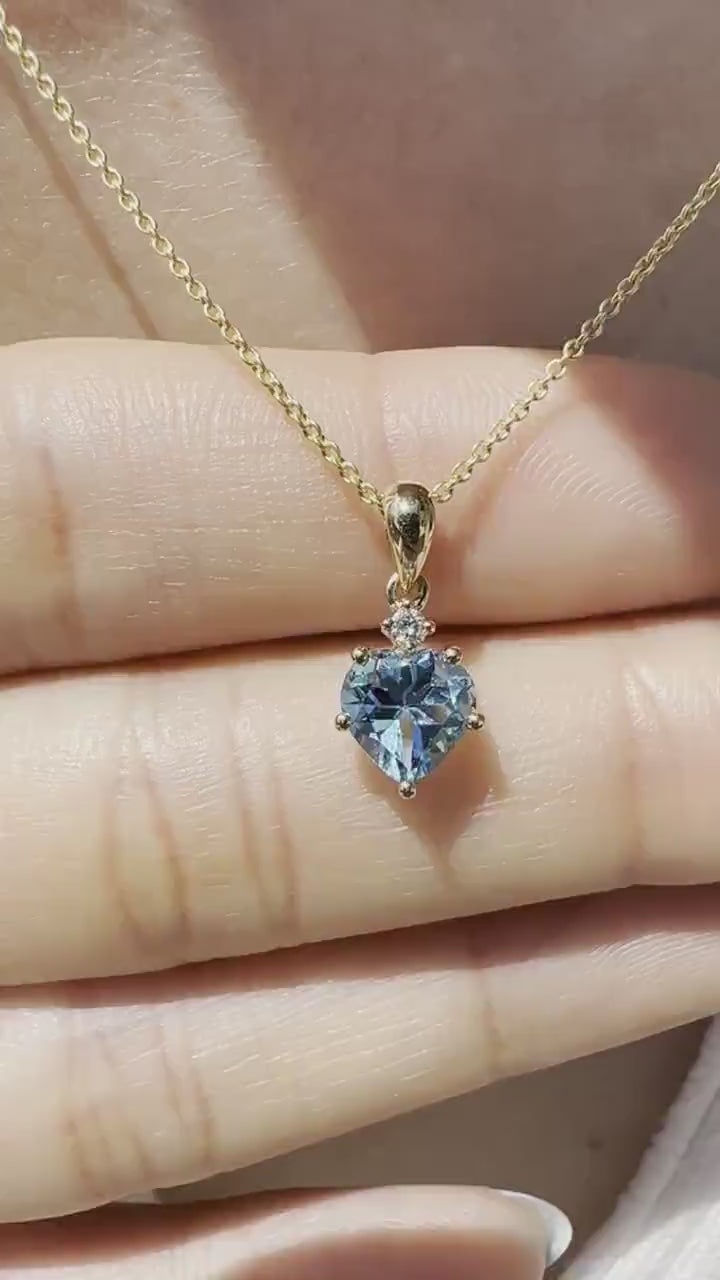 Blue topaz deals diamond pendant